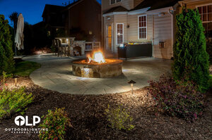 Austin home's backyard with outdoor firepit